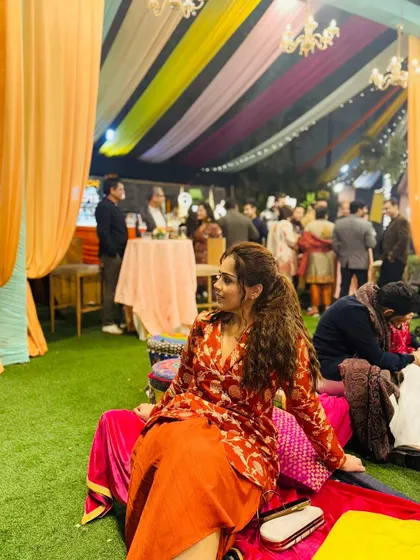 A side view of my Banarasi dhoti set. The unique silhouette is what makes this outfit stand out. It's comfortable, stylish, and perfect for a night of celebration.