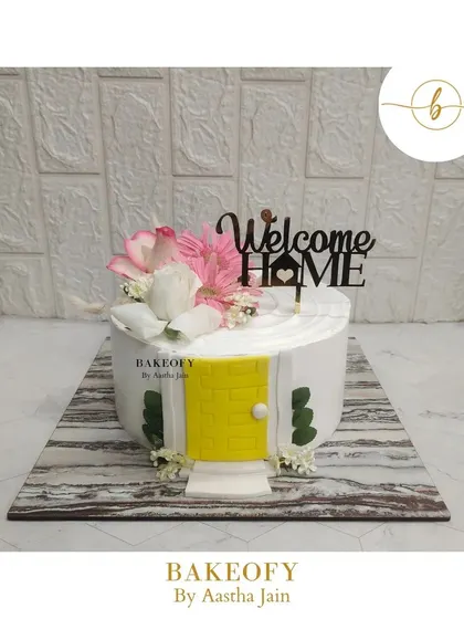 A sweet beginning in a new nest. This "Welcome Home" cake was a fresh mango flavor, designed to look like a charming little house.