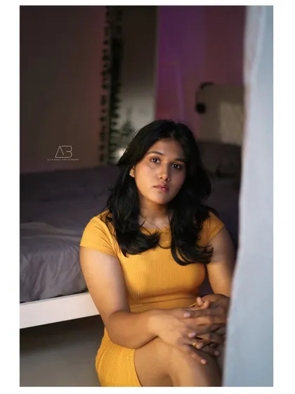 A different angle from the indoor cinematic shoot, this one feels more candid, as if we've just walked in on a quiet moment.