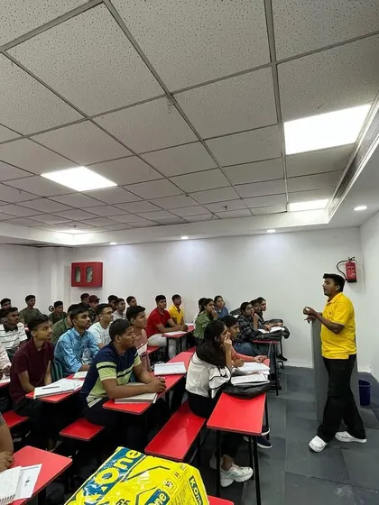 An instructor teaching a lesson on the smart board in our Delhi center. We focus on providing a high-tech learning experience to complement our rigorous NDA curriculum.