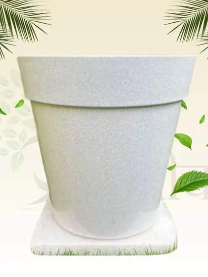 The Libro White Plastic Planter has a clean, marble-like finish that looks like ceramic but is much more durable and lightweight. It's 8 inches tall and UV-resistant.