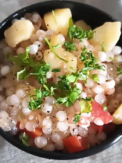 A close-up of my Sabudana Khichdi, garnished with fresh coriander. You can see the perfectly cooked, non-sticky tapioca pearls.