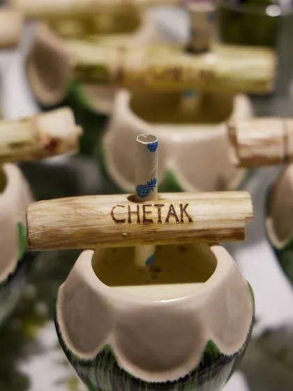 Paradise in a coconut shell. We serve refreshing coconut water with a custom-branded sugarcane stick, offering a natural and stylish beverage option.