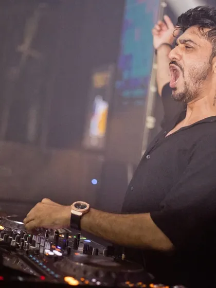 That moment when the beat drops and you can't help but feel the music. A shot of me hyping up the crowd mid-set.