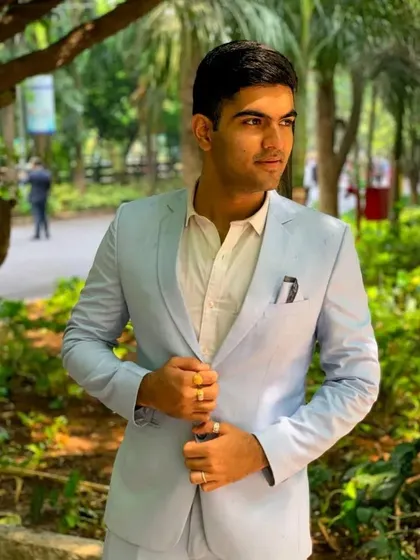 Another shot of the light blue blazer, a versatile piece that can be dressed up or down.
