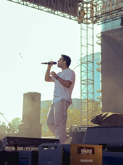 Singing my heart out under the sun at Zomaland. Outdoor festival gigs are a blast, and we know how to get a daytime crowd going with a powerful vocal performance.
