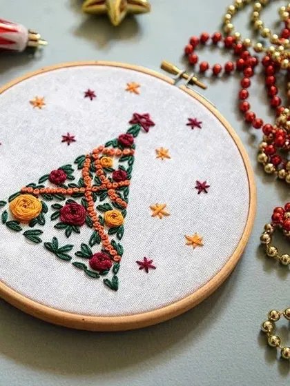 Get cozy with these Christmas-themed embroidery hoops. Featuring snowmen and festive stockings, these handmade pieces add a warm, personal touch to your holiday decor.