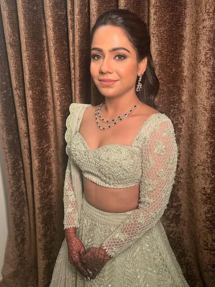 A close-up of the Sangeet look, featuring soft glam makeup with a focus on clean skin and defined eyes.