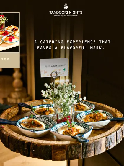 Pulled masala jackfruit served in individual ceramic pans on a rustic wooden tray. This is how we present modern vegetarian concepts with style and flair.