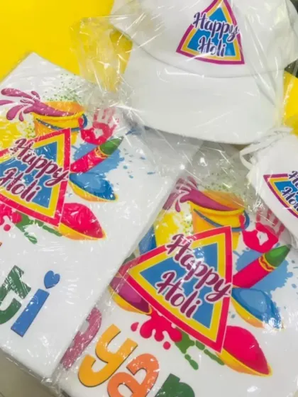A complete Holi celebration kit. This set includes a custom-printed "Happy Holi" t-shirt, a matching bucket hat, and a face mask, ensuring you're ready for the festivities.