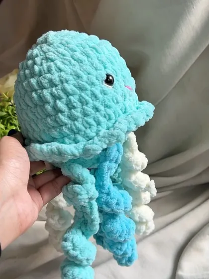 The side profile of our calming octopus plushie. The quality of the stitch work ensures it is durable and safe for your little one.
