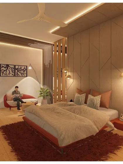 A different angle of this rustic-chic bedroom, highlighting the reading nook with a comfortable red armchair. The design focuses on creating distinct functional zones within a single, harmonious space.