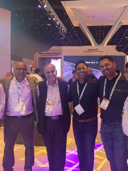 My team and I connecting with partners and clients at an industry trade show. These events are crucial for me to stay updated on the latest innovations and ensure I am offering the best possible solutions.