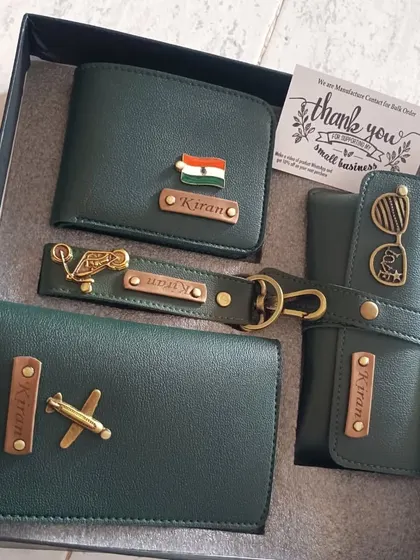 A beautiful green-themed gift set including a personalized wallet, passport holder, eyewear case, and keychain, all with unique charms.