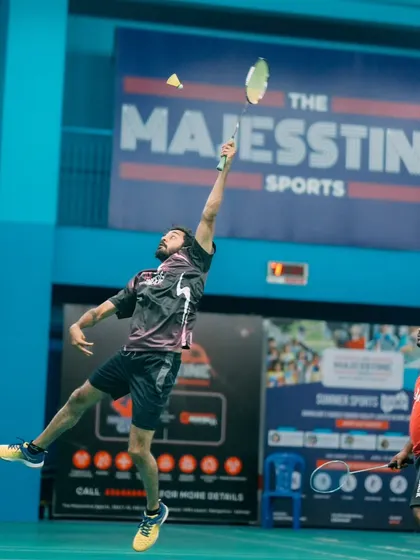 An employee from Gameskraft executes a perfect jump smash during their corporate tournament. Our professional grade courts with teak wood flooring and excellent lighting allow players to perform at their best.