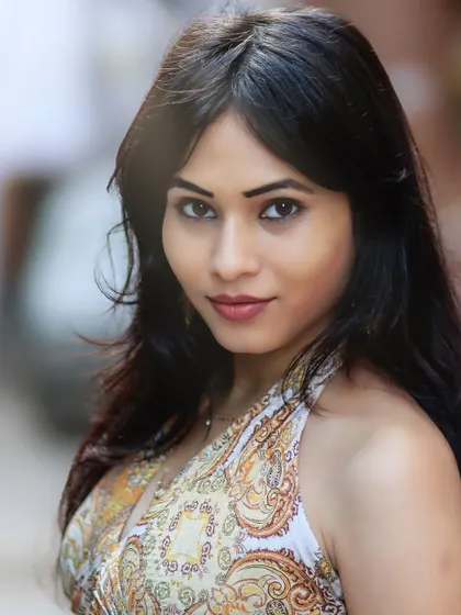 A stunning close-up that captures her beautiful features and direct, engaging gaze.