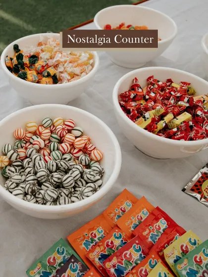 A nostalgia counter with 90s candies is a fun and unexpected detail that brings a smile to every guest's face.