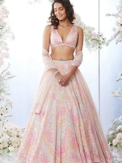 The multi-color sequin look is so joyful and celebratory. Inspired by this, I can create a fun and vibrant lehenga for your sangeet or mehendi.