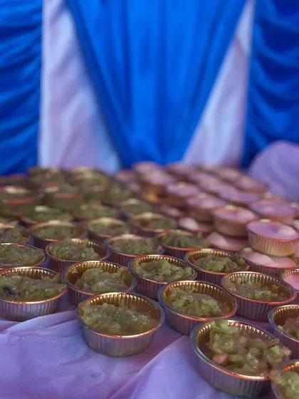 Portions of our traditional green-colored sweet dish, ready to be served. We prepare our desserts in easy-to-handle cups for convenience at parties.
