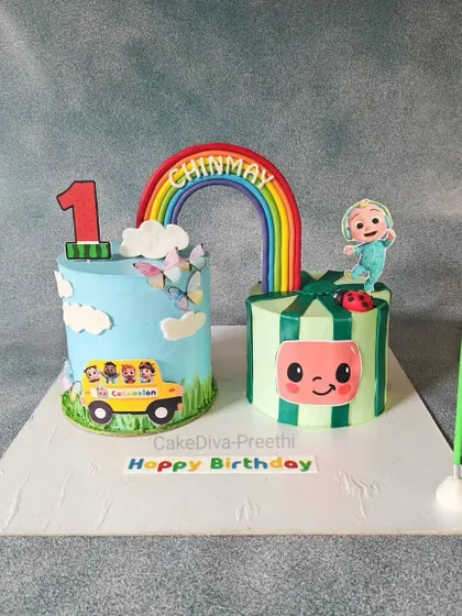 Here is another Cocomelon design, with two cakes connected by a fondant rainbow. This setup is great for larger parties or when you want to feature different aspects of a theme.