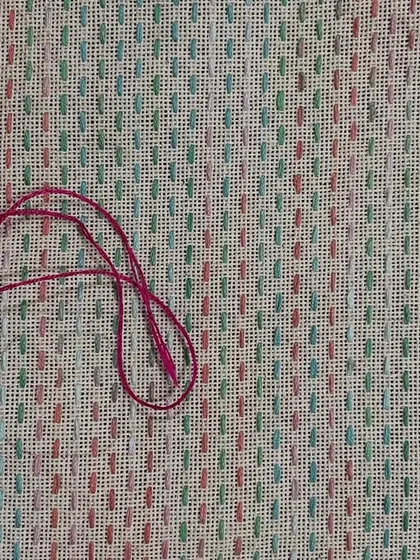 This piece, stitched with variegated thread, was intended to be a spectacle case or mobile pouch. The pattern is a blend of Sashiko and Kasuti styles.