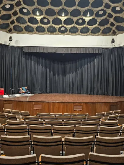 A view of the stage at the India International Centre in Delhi, with the musicians set up for the performance. The auditorium itself, with its unique honeycomb ceiling, has a wonderful atmosphere.