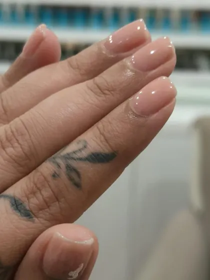 A final view of this simple yet stunning rosy-nude manicure. The high-gloss finish makes the nails look healthy, strong, and perfectly polished.