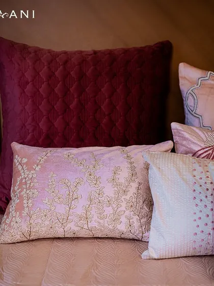 Create a space that reflects your unique style and love for nature. This assortment of cushions from my Lotus collection, featuring floral embroidery in shades of pink and maroon, allows you to do just that.