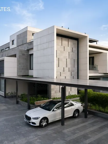 A closer look at the sleek lines and modern elegance of Residence 338's exterior. The cantilevered structures and material choices reflect a contemporary architectural language.