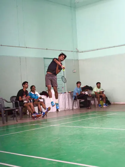 The follow-through of a smash, a critical part of the shot that ensures accuracy and power.