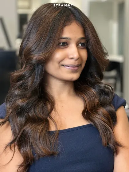 The perfect finish to a balayage appointment. This client is glowing with her new custom color and soft, bouncy blowout.