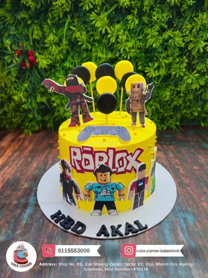 Level up the birthday party with this bright yellow Roblox-themed cake. Featuring popular characters and a controller, it's the perfect cake for any young gamer's celebration.