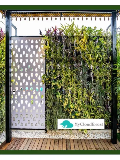 My work is about creating harmony between nature and architecture. This outdoor vertical garden is integrated with a custom-designed decorative screen and pergola, creating a modern and elegant entrance that feels both structured and alive.