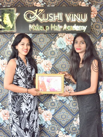 Presenting a certificate to another one of my talented students. I wish her all the success in the world.