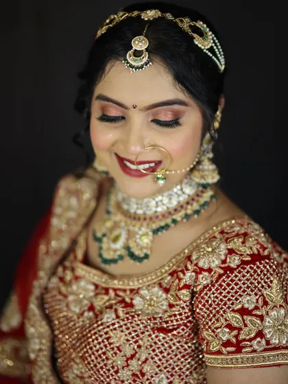 Another beautiful shot of the bride, showing how the makeup looks from a different angle. The smile says it all.