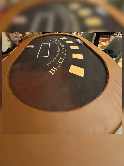A professional blackjack table ready for action, a key element in creating an authentic and exciting casino night experience.