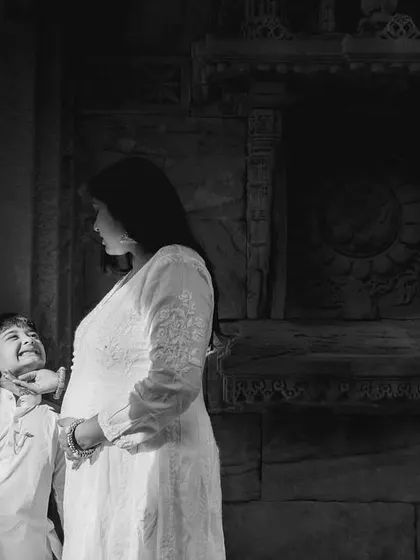The pure joy and laughter of a child looking up to his mother, knowing their world is about to change in the most wonderful way.