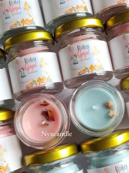 These personalized mini jar candles were created for a "Baby Goyal on board" announcement, featuring a cute jungle theme.