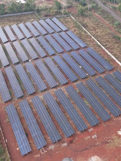 Another perspective of the 1.3 MW solar power plant, highlighting its integration into the rural landscape. Such projects are vital for creating a decentralized and resilient energy infrastructure for India.