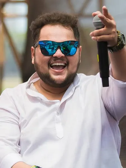 On the mic and feeling the love from the massive Holi festival crowd. My goal is to make sure every single person feels connected to the music.