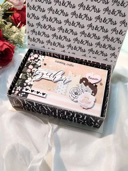 The box for the anniversary mini scrapbook, with "Mr & Mrs" script.