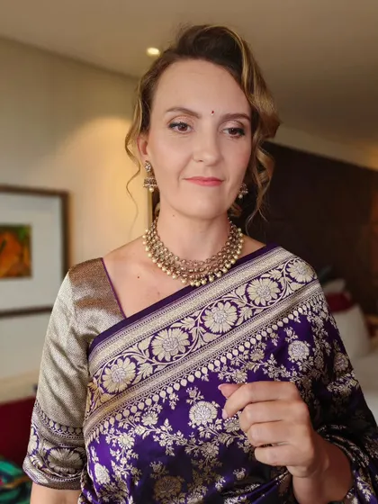 A close-up of her makeup. I used soft pink and brown tones to create a look that is both pretty and sophisticated.