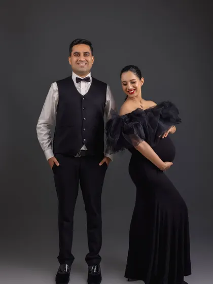A stylish, confident pose from the same formal session. This showcases how I can create a variety of moods, from romantic to fashionable.