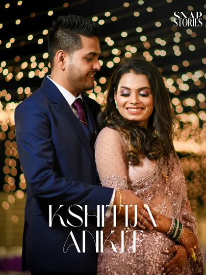 A stylish portrait of a couple at their evening reception. The bokeh background adds a touch of magic to this modern wedding photo.