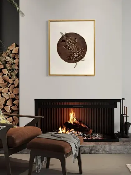 The botanical wall art hung above a cozy fireplace, showing how it can bring a touch of nature to even the most modern and sophisticated spaces.
