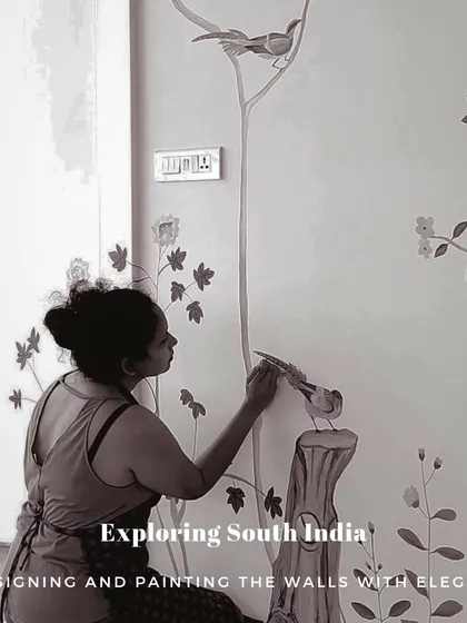 A duplicate image of me painting a bird on the French-themed mural.