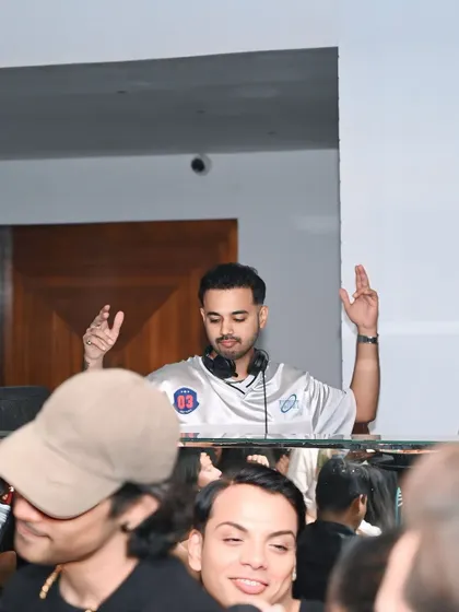 Hands up, feeling the beat at Escobar Mumbai. It's a physical reaction to the music.