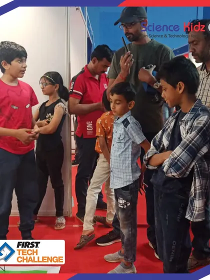Our team engaging with judges and visitors at the First Tech Challenge. This experience teaches them not only technical skills but also how to communicate their ideas clearly and confidently.