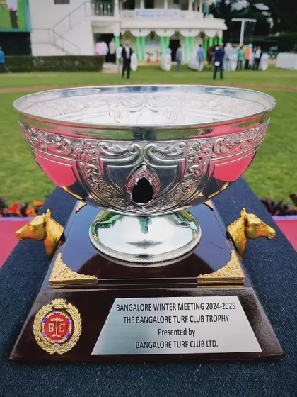 The Bangalore Turf Club Trophy, an ornate silver bowl with intricate carvings.