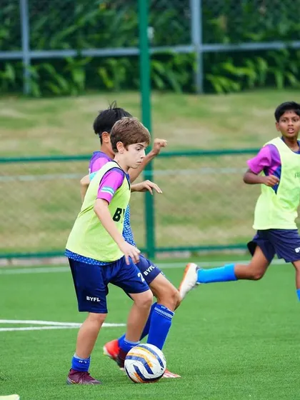 Players engage in a small-sided game to improve their decision-making and skills in tight spaces.